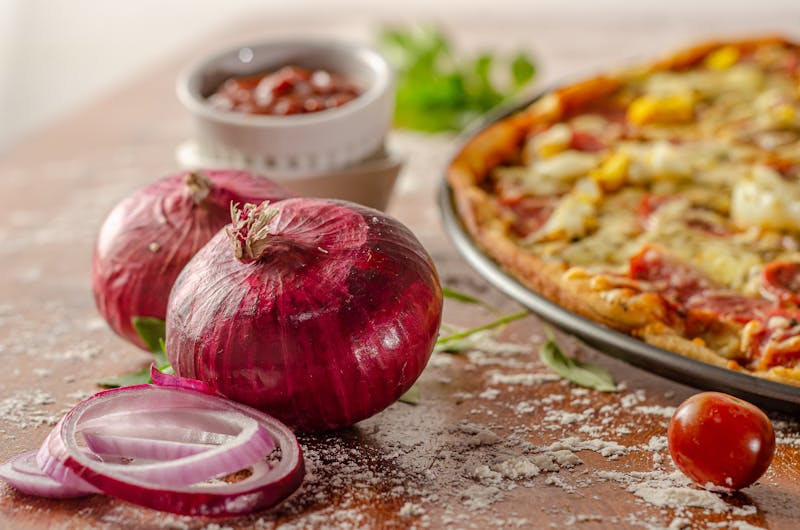 BBQ chicken pizza with caramelized onions