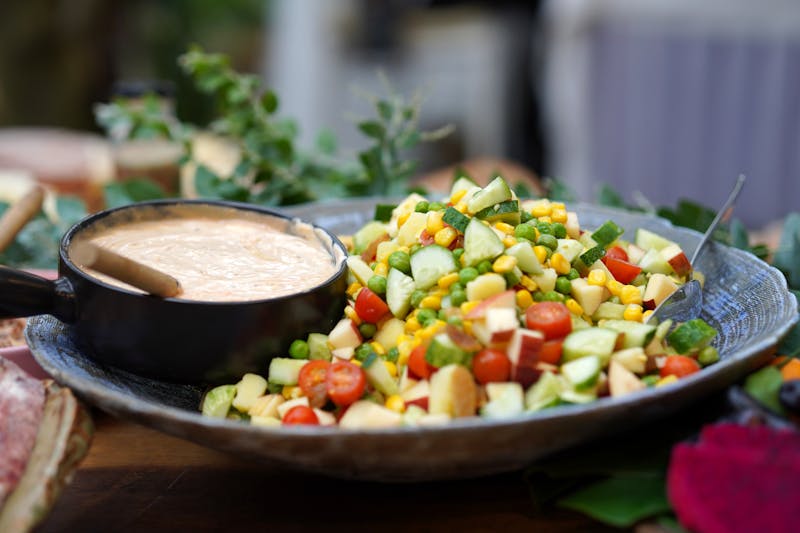 Chopped salad with fresh vegetables and dressing