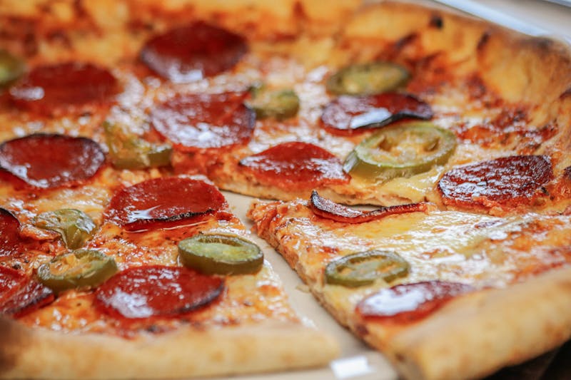 Spicy pepperoni pizza with jalapeños